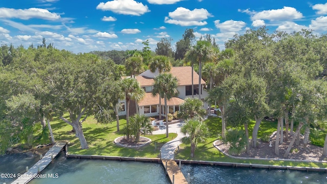 birds eye view of property featuring a water view