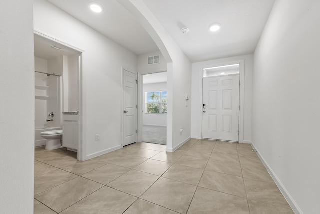 entrance foyer featuring light tile patterned flooring