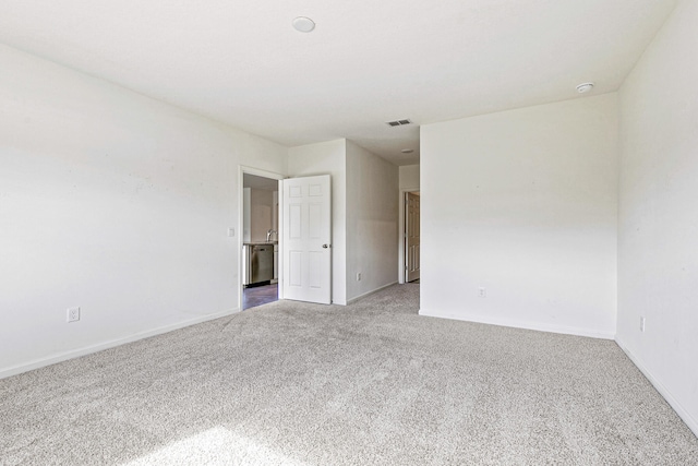 view of carpeted spare room