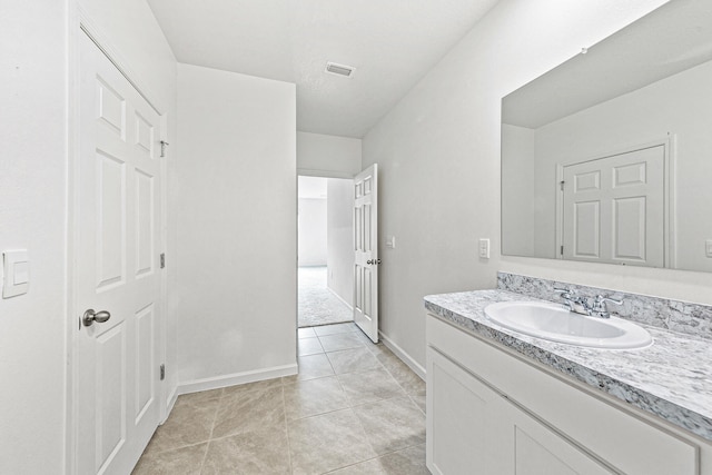 bathroom featuring vanity and tile patterned floors