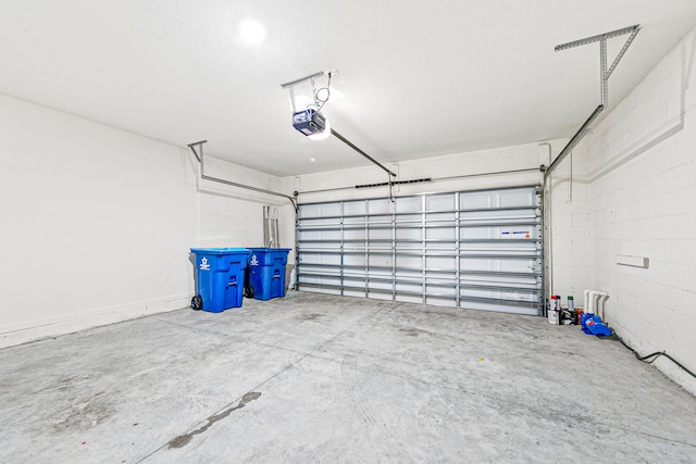 garage featuring a garage door opener