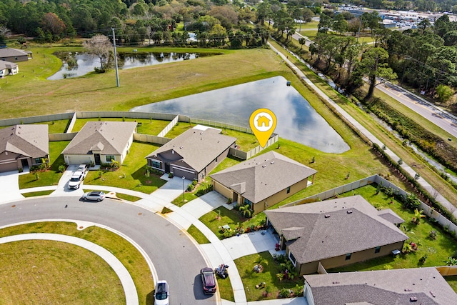 drone / aerial view featuring a water view