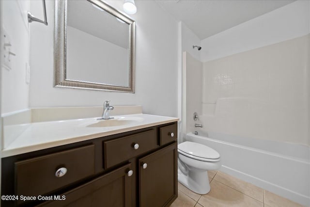 full bathroom featuring toilet, vanity, shower / bath combination, and tile patterned floors