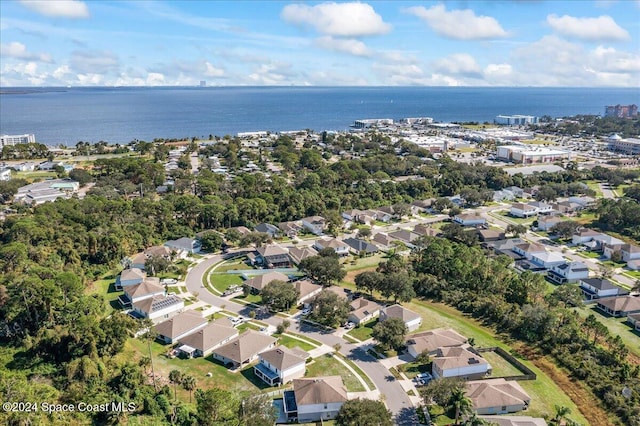 drone / aerial view featuring a water view