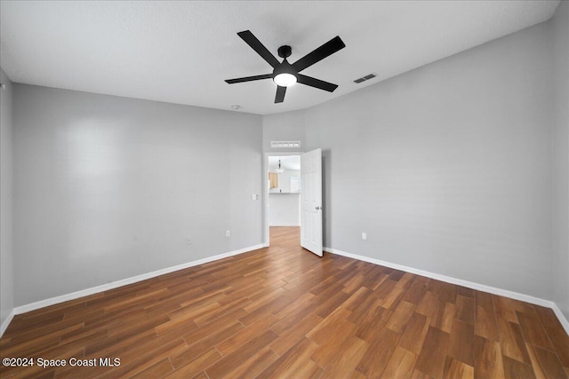 unfurnished bedroom featuring wood-type flooring and ceiling fan