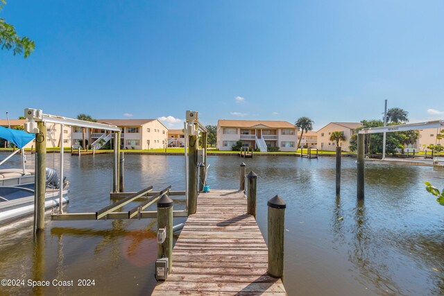 view of dock with a water view