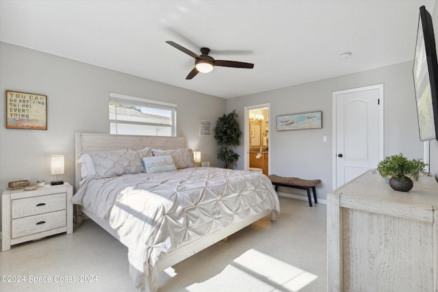 bedroom with ceiling fan and ensuite bathroom