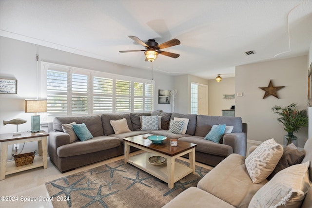 living room featuring ceiling fan