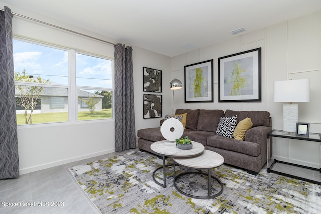 living room featuring light tile patterned floors