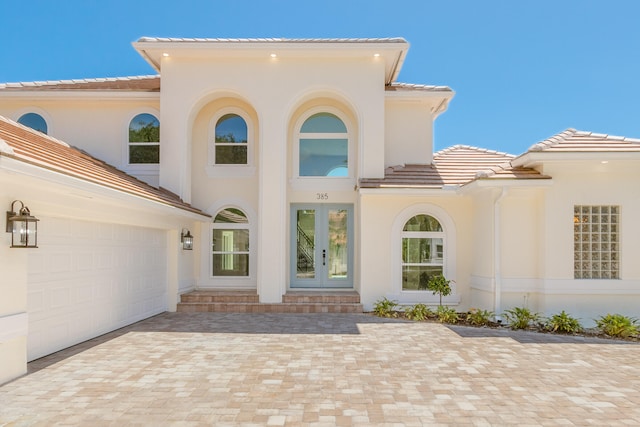 view of front of property with a garage