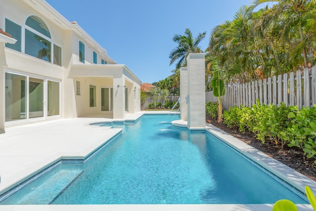 view of pool featuring a patio area