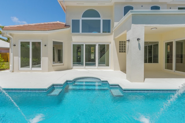 rear view of house with a patio area