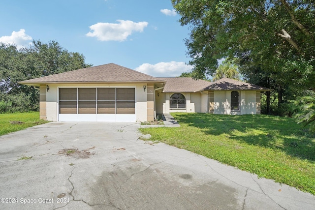 single story home with a front yard