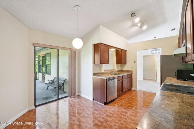 kitchen with light tile patterned floors, a textured ceiling, decorative light fixtures, dishwasher, and vaulted ceiling