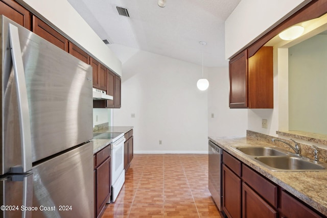 kitchen featuring lofted ceiling, hanging light fixtures, light tile patterned floors, sink, and stainless steel appliances