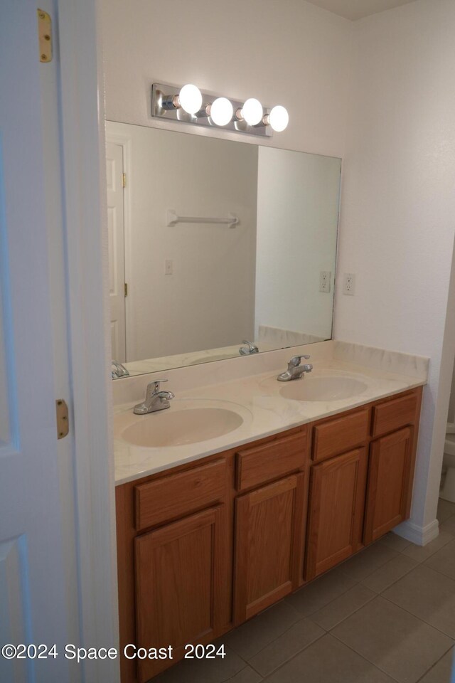 bathroom featuring vanity and tile patterned floors