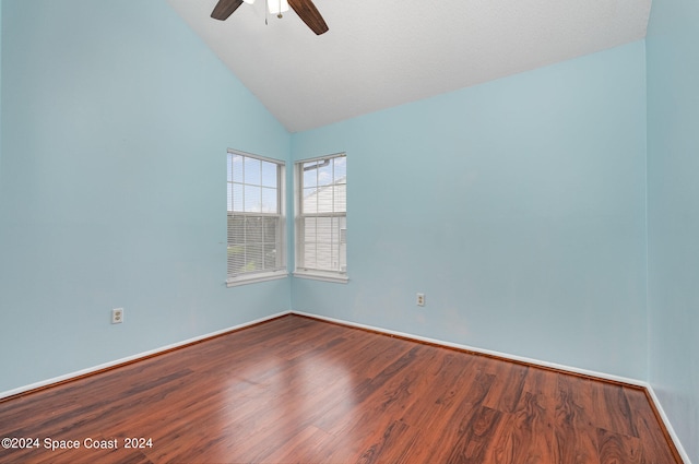 unfurnished room with ceiling fan, hardwood / wood-style floors, and high vaulted ceiling