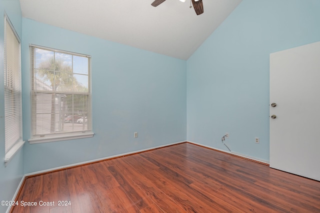 unfurnished room featuring ceiling fan, vaulted ceiling, and hardwood / wood-style floors