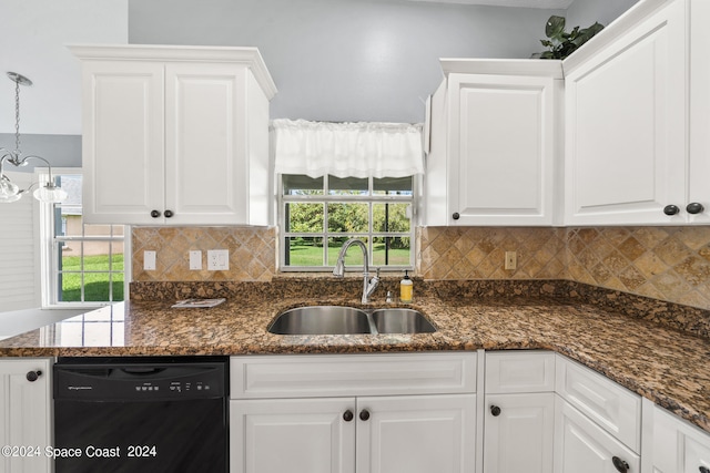 kitchen featuring white cabinets, sink, decorative light fixtures, dishwasher, and dark stone counters