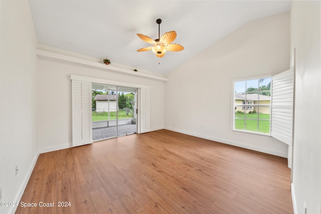 empty room featuring light hardwood / wood-style flooring, ceiling fan, and plenty of natural light