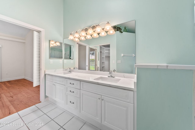 bathroom featuring vanity and hardwood / wood-style floors