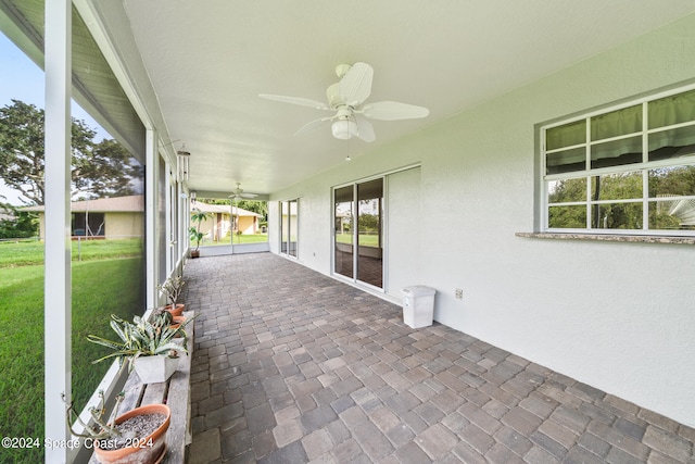 view of patio featuring ceiling fan