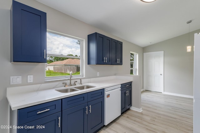 kitchen with lofted ceiling, dishwasher, sink, and plenty of natural light