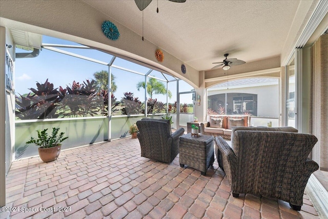 exterior space featuring ceiling fan