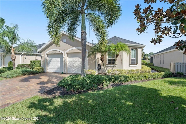 view of front of home with a front lawn