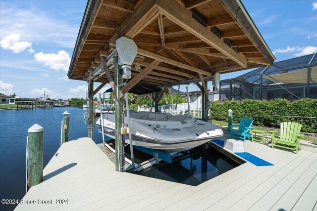 dock area with a water view