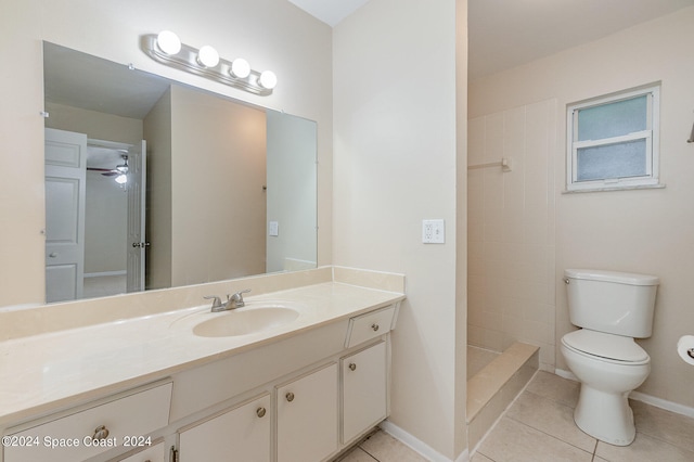 bathroom with vanity, walk in shower, ceiling fan, toilet, and tile patterned floors