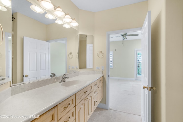 bathroom featuring vanity, ceiling fan, and tile patterned floors