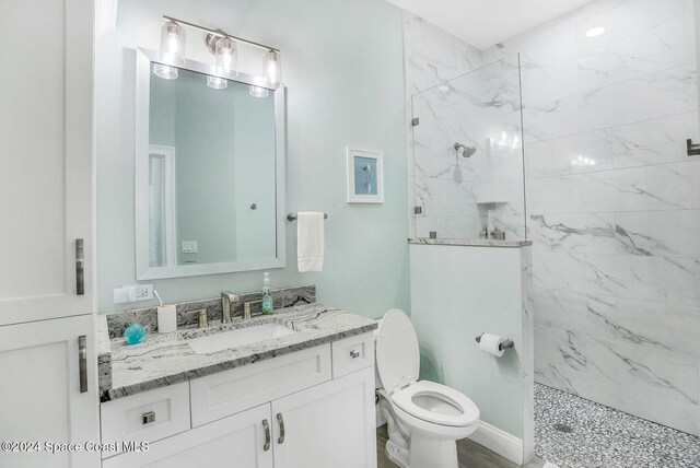 31 Seabridge Dr, Ormond Beach, FL 32176 - full bathroom featuring a marble finish shower and vanity