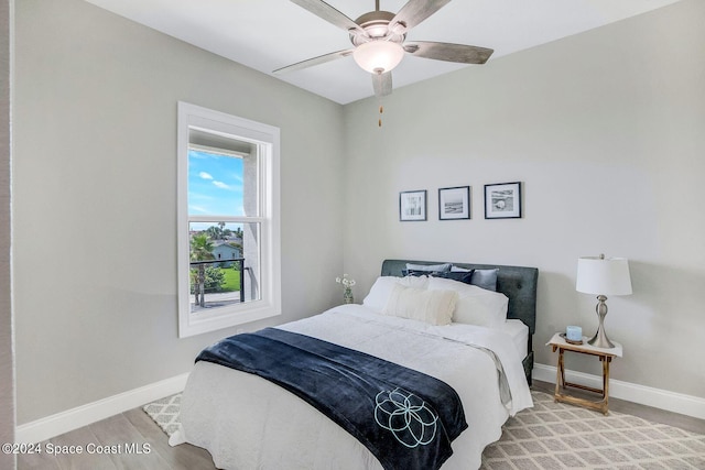 31 Seabridge Dr, Ormond Beach, FL 32176 - bedroom featuring wood finished floors and a ceiling fan