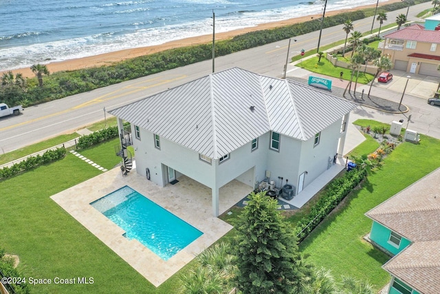 aerial view with a view of the beach and a water view