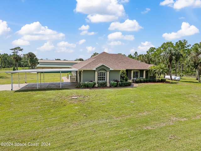 ranch-style home featuring a front lawn