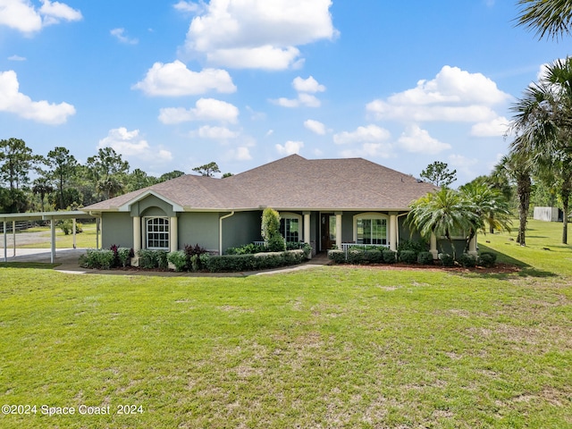 single story home with a carport and a front lawn