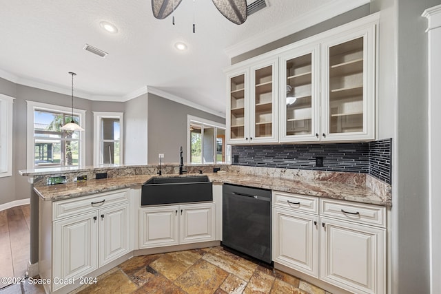 kitchen with crown molding, black dishwasher, sink, and a wealth of natural light