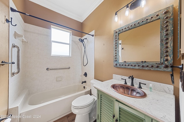 full bathroom with crown molding, tiled shower / bath combo, vanity, and toilet