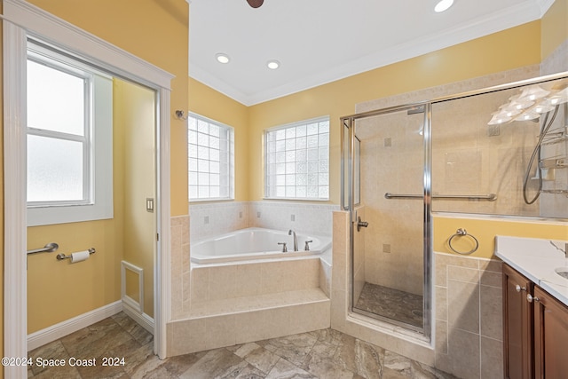 bathroom with vanity, shower with separate bathtub, and crown molding