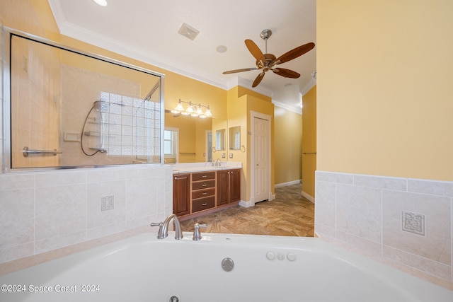 bathroom featuring ornamental molding, vanity, ceiling fan, and a tub