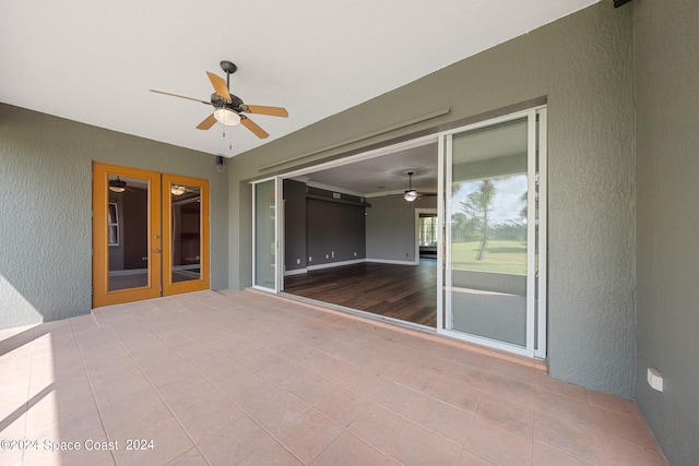 view of patio with ceiling fan