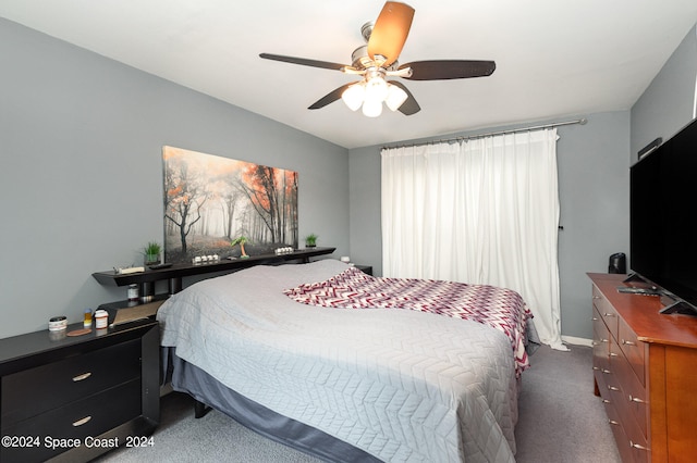 bedroom featuring ceiling fan and carpet flooring