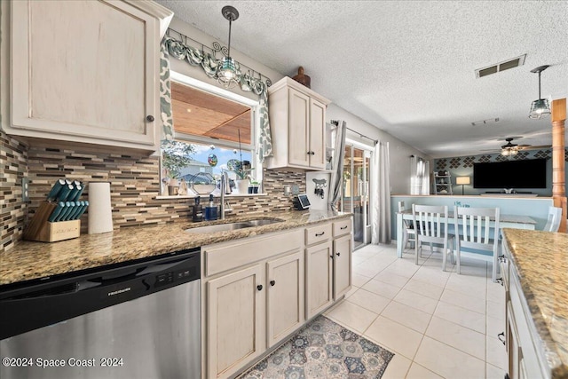 1710 Brookshire Cir, Melbourne, FL 32904 - kitchen with light tile patterned flooring, a sink, stainless steel dishwasher, visible vents, and ceiling fan