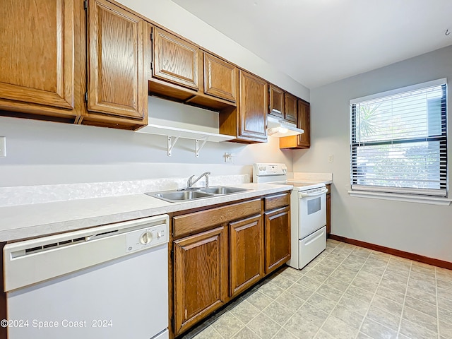 kitchen with white appliances and sink