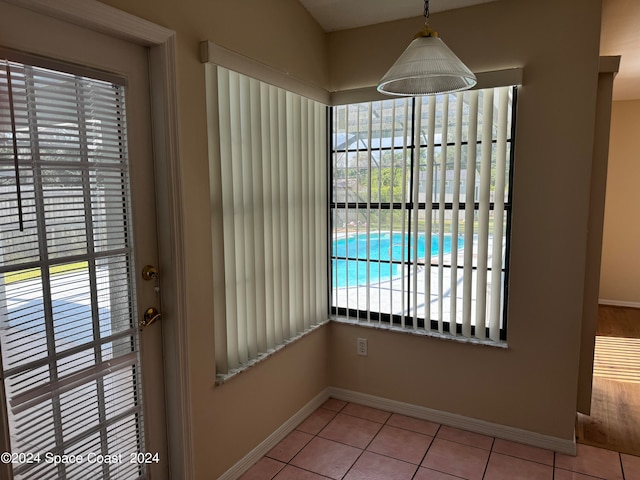 interior space featuring light tile patterned flooring