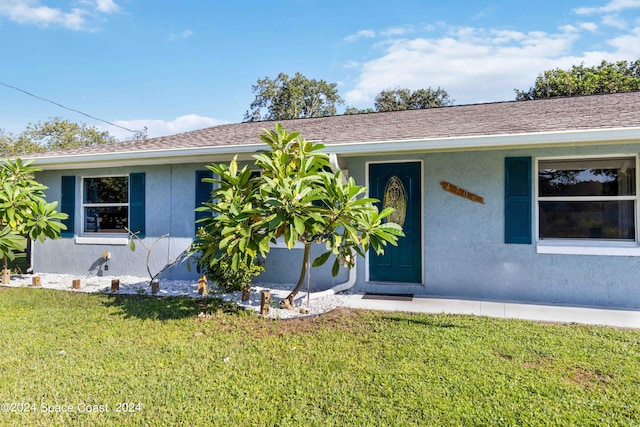 view of front of house with a front yard