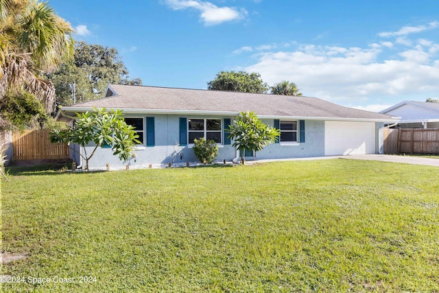 single story home featuring a front lawn