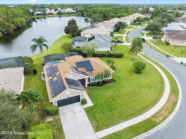 birds eye view of property featuring a water view