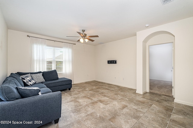 living room with ceiling fan